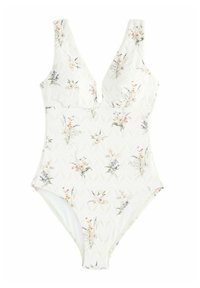 Bílé jednodílné plavky s hlubokým výstřihem do V, texturovanou tkaninou a jemným květinovým vzorem v pastelových barvách.
