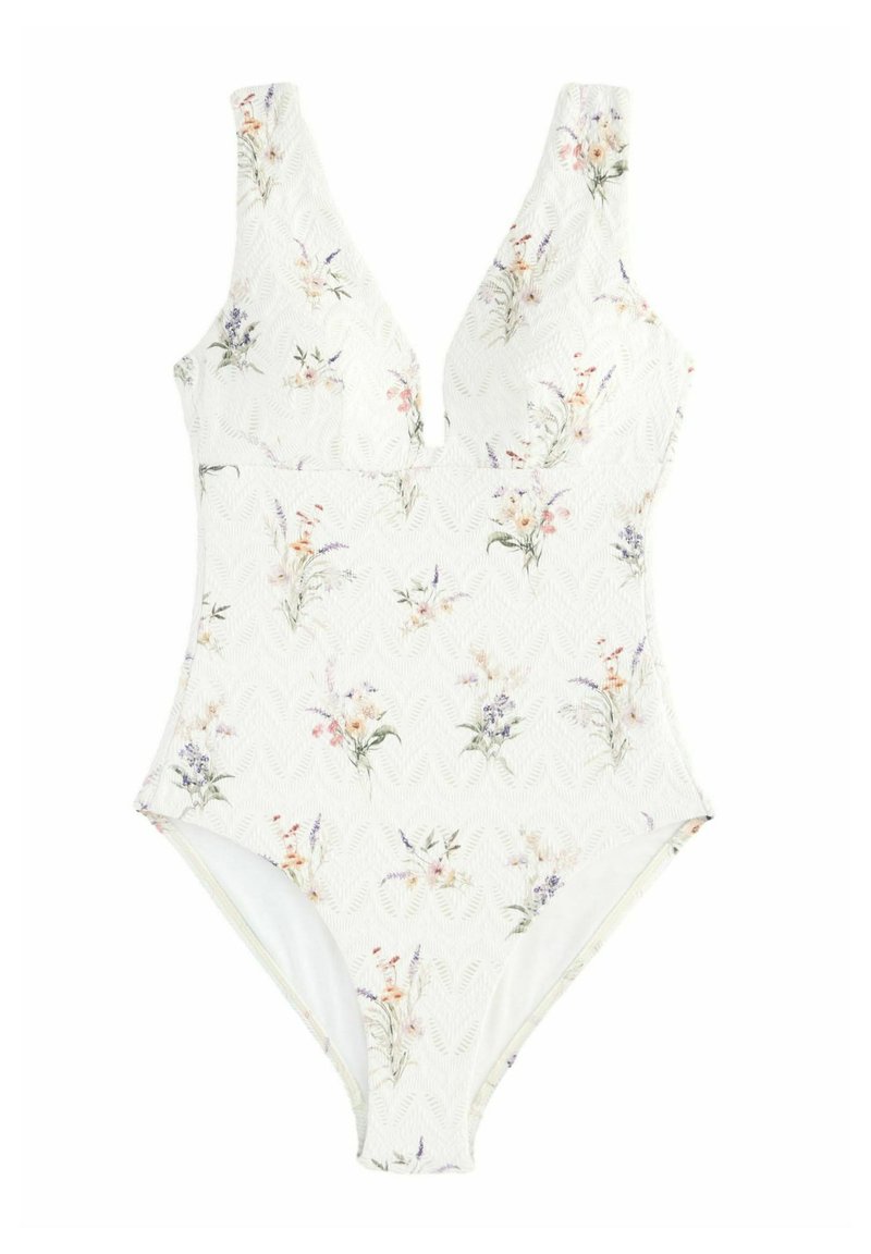 Bílé jednodílné plavky s hlubokým výstřihem do V, texturovanou tkaninou a jemným květinovým vzorem v pastelových barvách.