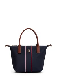 Sac fourre-tout bleu marine avec deux poignées marron, des bandes verticales rouge, blanche et bleue, et un petit logo doré centré à l'avant.