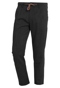 Pantaloni neri slim-fit con tessuto testurizzato, tasche frontali e vita con coulisse a motivo.