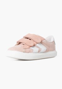 Pink suede sneaker with white Velcro straps, white rubber sole, and white chevron accents on the sides. Low-top design. Textured finish.