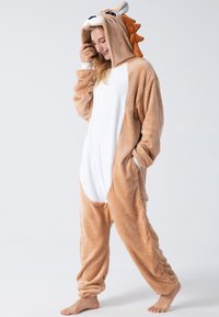 Brown and white fleece onesie with a lion design; features a hood, ears, and plush spikes along the back; includes side pockets.