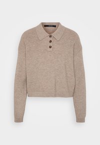 Beige cropped sweater with a ribbed texture, three-button placket, and a classic collar. Long sleeves, soft fabric, and casual design.