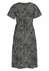 Robe midi noire à manches courtes avec motif de pois blancs irréguliers et ceinture ajustée à la taille, vue de dos.