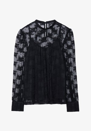 Blusa nera trasparente con lunghe maniche in pizzo e colletto alto. Motivo floreale decorativo su tutta la superficie. Chiusura a oblò sul retro e polsini aderenti.