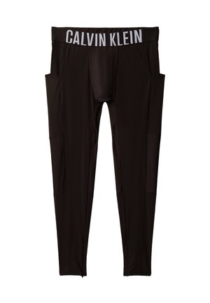 Zwarte sportbroek met een witte tailleband met het "Calvin Klein"-logo, voorzien van zijzakken van mesh en ritsen bij de enkels. Glad, rekbaar materiaal.
