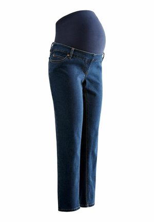 Blå graviditetsjeans med elastisk talje, designet til at sidde behageligt over en gravid mave.