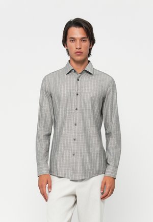 Long-sleeve checkered shirt in gray tones, featuring a button-down front and a smooth texture, with subtle black accents and a structured collar.