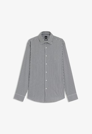 Camicia a maniche lunghe a righe bianche e nere con colletto, bottoni sul davanti e polsini a righe bianche a contrasto. Realizzata in tessuto liscio.