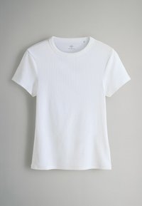Weißes Kurzarm-T-Shirt aus weicher Baumwolle mit gerippter Textur, runder Ausschnitt und geradem Saum.