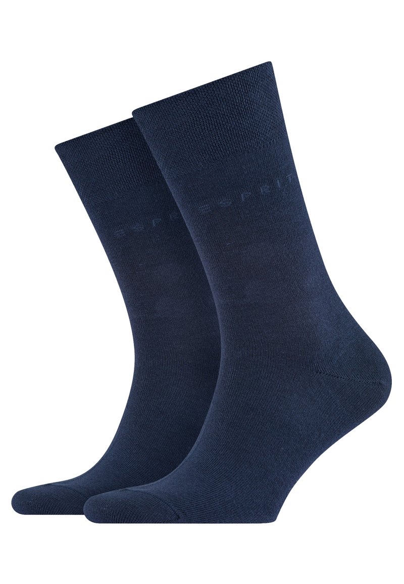 Calzini in cotone blu navy con una texture liscia, dotati di punta e tallone rinforzati, e un sottile marchio vicino alla parte superiore.