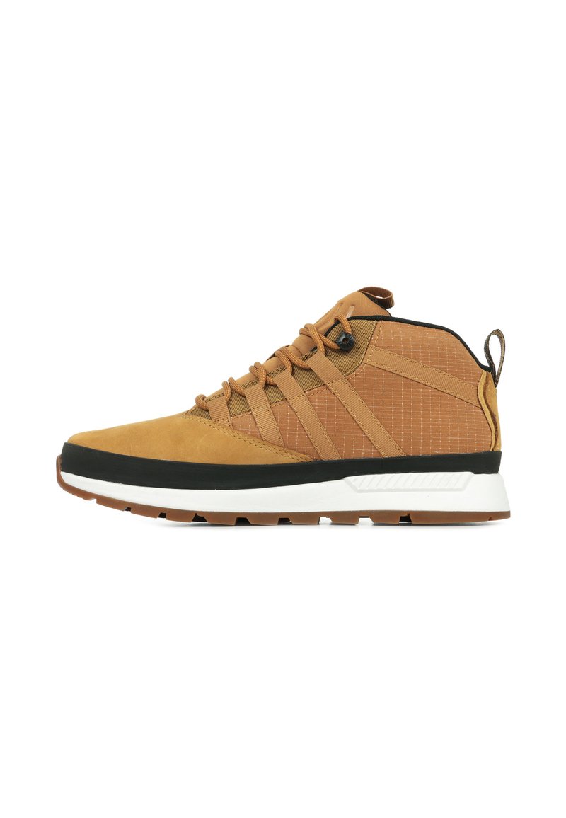 Brown high-top sneaker featuring mesh and suede material, reinforced stitching, rubber outsole, and a white midsole with a subtle grid pattern.