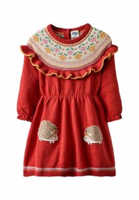 Punainen neulemekko, jossa on teksturoitu yläosa kukkakuviolla, röyhelökaulus ja siilin aplikaatiot etuosassa.