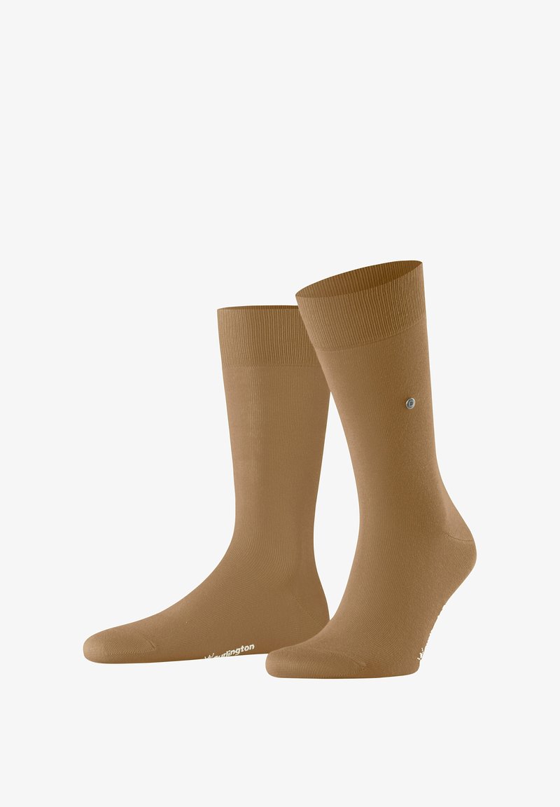 Calze in misto cotone marroni con bordi a coste, texture liscia e dettaglio del logo sul lato. Design alla caviglia per comfort e stile.