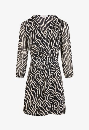 Short-sleeve black and cream dress with a zebra stripe pattern, featuring a V-neckline and a fitted waist, made from lightweight fabric.