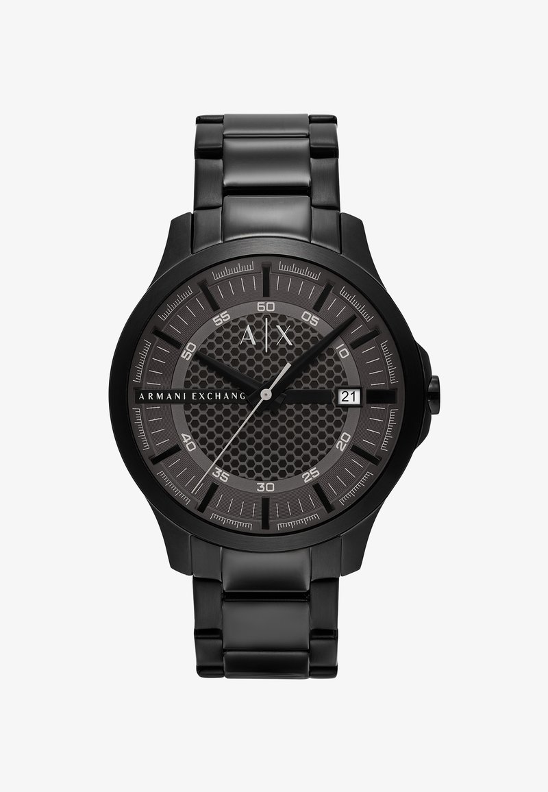Čierne Armani Exchange hodinky s kovovým remienkom, ciferníkom s včelím plástom, striebornými ručičkami, zobrazením dátumu na 21 a minútovými značkami.