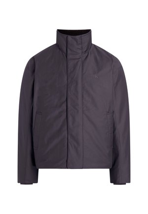 Dark gray jacket with a high collar, front pockets, and a smooth, water-resistant texture; features a subtle logo on the chest.