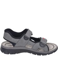 Gray sandal with adjustable straps, soft upper material, cushioned footbed, and textured rubber sole. Features accent details and cutouts.