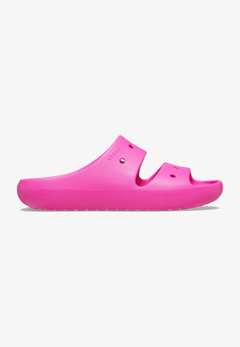 Infradito in plastica rosa modellata con punta aperta, fori di ventilazione e suola texturizzata per una buona aderenza. Logo del marchio presente sul lato.