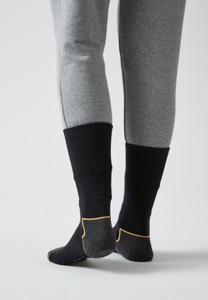 SNOCKS 2 PACK - Socken - schwarz/gelbe akzente