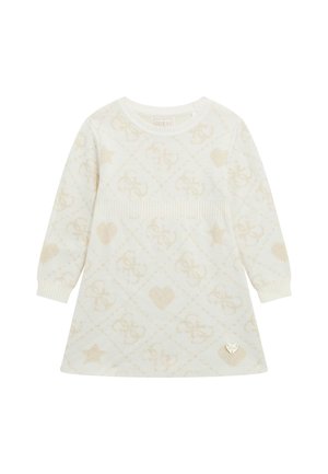 Cream long-sleeve knitted dress with subtle beige heart, star, and logo patterns, ribbed waist detail, and small heart-shaped metal tag near hem.