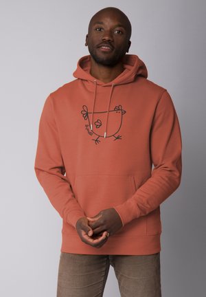 Rust-colored hoodie made of cotton blend, featuring a black chicken graphic on the front, adjustable drawstrings, and kangaroo pocket.