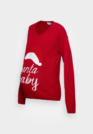 Pull de maternité rouge avec le texte "Santa Baby" et un bonnet de Père Noël blanc et rouge tricoté sur le devant, présenté sur un fond blanc.