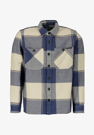 Koszula w kratę w kolorze kremowym i granatowym, z zapięciem na guziki z przodu, dwiema kieszeniami na piersi i kołnierzykiem. Wykonana z teksturowanej tkaniny w wzór kraty.