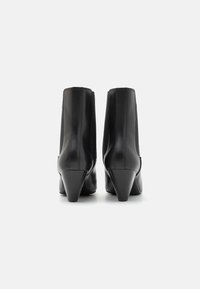 Calvin Klein Jeans CONE HEEL BOOT  - Bottines - triple black