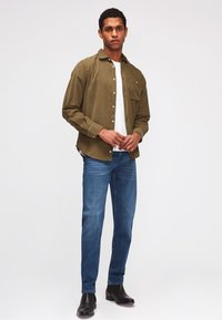 7 for all mankind Jeans Tapered Fit - mid blue