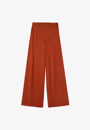 Wijde broek in roestkleur met elastische tailleband en zijzakken, gemaakt van zachte, vloeiende stof.
