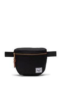 Black fabric pouch bag with a gold zipper, leather pull tab, and a brand label. Features a rounded shape and side handle for easy carrying.