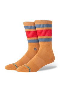 Orange socks with blue and red stripes, ribbed texture, reinforced heel and toe, and a small emblem on the side.
