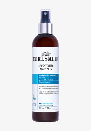 Brown bottle of Curlsmith Effortless Waves styling spray with spray nozzle, containing 237 mL, for wavy hair with vegan ingredients.