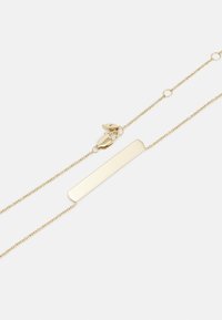 Gold-tone chain necklace with a rectangular bar pendant. Adjustable length with a clasp closure. Smooth surface and minimal design.