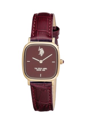 Square gold-tone watch with dark red dial and textured leather strap, featuring U.S. Polo Assn. logo and simple hour markers.