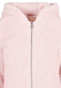 Felpa rosa in pile con zip, caratterizzata da una consistenza morbida e pelosa, dotata di una cerniera frontale e di un cappuccio foderato. Design minimalista, senza motivi o dettagli.