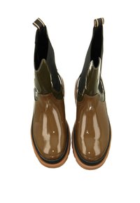 Brown patent leather ankle boots with black elastic panels and tan rubber soles, featuring pull tabs for easy wear.
