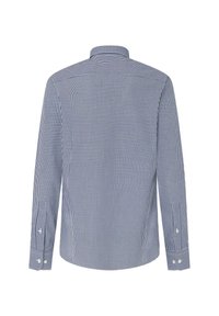 Long-sleeve shirt in navy and white gingham pattern, featuring a spread collar and button closures with a curved hem and textured fabric.
