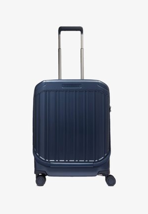 Marineblaue Hartschalenkoffer mit vertikalen Rillen, Teleskopgriff, vier Rädern und Reißverschlussverschluss. Robustes Material und glatte Textur.