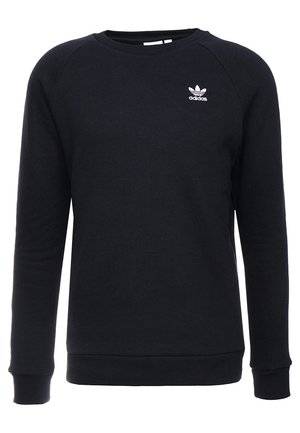 Czarna bluza z długim rękawem i okrągłym dekoltem, z małym białym logo Adidas na lewej górnej piersi, z prążkowanymi mankietami i ściągaczem u dołu.