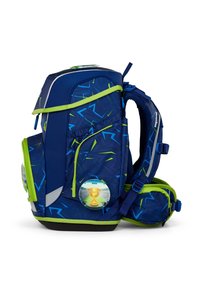 Blue and green backpack featuring geometric patterns, multiple compartments, and two circular patches. Made of durable fabric with padded straps.