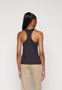 Puma RACERBACK TANK - Top - black