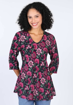 Floral top in dark fabric, featuring a V-neck, ¾ sleeves, and pink flowers with green leaves. Hemline flares out slightly.
