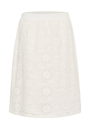 Jupe blanche en coton brodé avec des motifs circulaires et floraux, dotée d'empiècements en dentelle et d'une taille élastique.