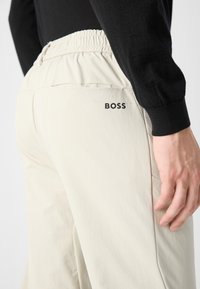 BOSS ZEM - Hlače - light beige