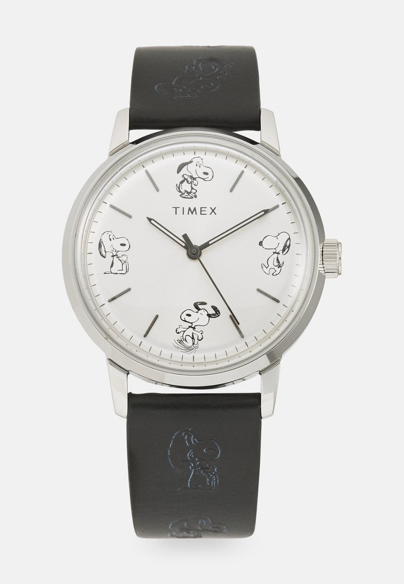 Timex watch with a silver case, white dial featuring Snoopy illustrations, black leather strap with embossed Snoopy design.