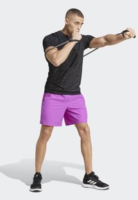 adidas Performance GYM SEAMLESS - Sportovní tričko - black   grey six