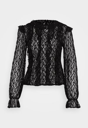 Mustast pitsist pikkade varrukatega top, millel on istuv disain, volangiga detailid õlgadel ja mansettidel ning kogu pinnal tekstuuriga lillemuster.