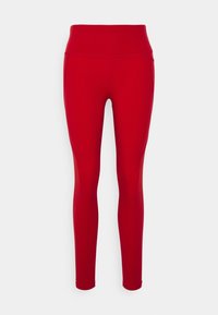 Červené legíny s vysokým pasem, hladkým povrchem a přiléhavým střihem. Obsahují postranní panely pro přidaný detail a elegantní siluetu.